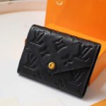 {Style No: HZ55VWX8} VICTORINE WALLET 12CM BLACK MONOGRAM EMPREINTE LEATHER