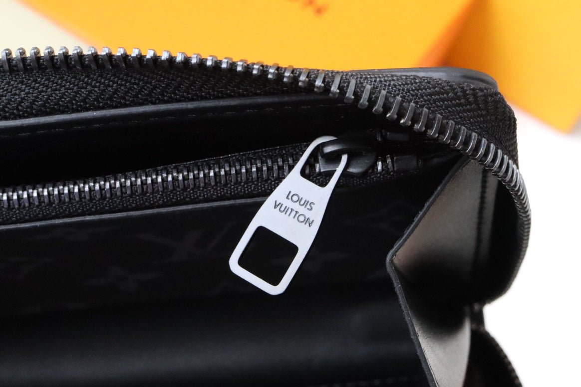 {Style No: 2A3FX5A8} TRUNK ZIPPY WALLET 19.5 BLACK MONOGRAM CANVAS - Image 10