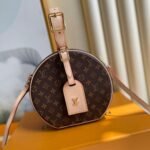 {Style No: 8QCYMNQR} LV 25S PETITE BOITE CHAPEAU 17 IN BROWN MONOGRAM COATED CALFSKIN