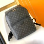 {Style No: B1UPPTAU} DISCOVERY PM BACKPACK 40 IN BLACK MONOGRAM ECLIPSE CANVAS AND CALFSKIN