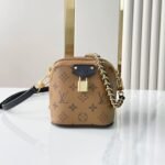 {Style No: 1OH4B7T5} JUST IN CASE 14 IN BROWN MONOGRAM REVERSE CANVAS GOLD HARDWARE