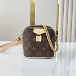 {Style No: XOIJQSP5} JUST IN CASE 14 IN BROWN MONOGRAM CANVAS GOLD HARDWARE