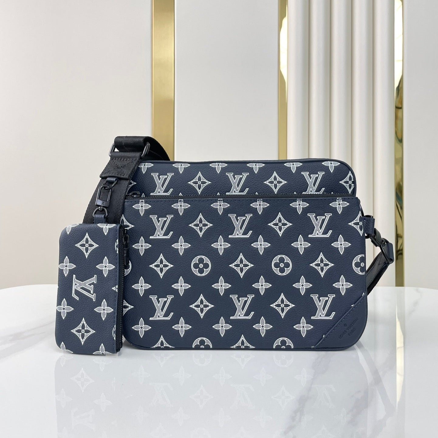 {Style No: L31JR6JR} TRIO MESSENGER 25 IN PRUSSIAN BLUE MONOGRAM SHADOW CALFSKIN