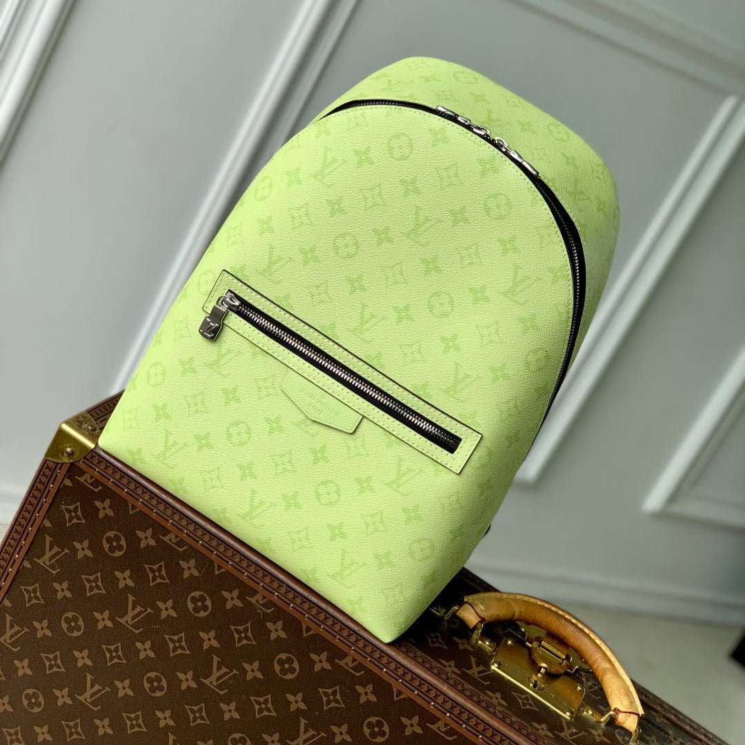 {Style No: 9BMHVVID} DISCOVERY SLIM BACKPACK 38 IN LEMON YELLOW MONOGRAM ECLIPSE REVERSE CALFSKIN
