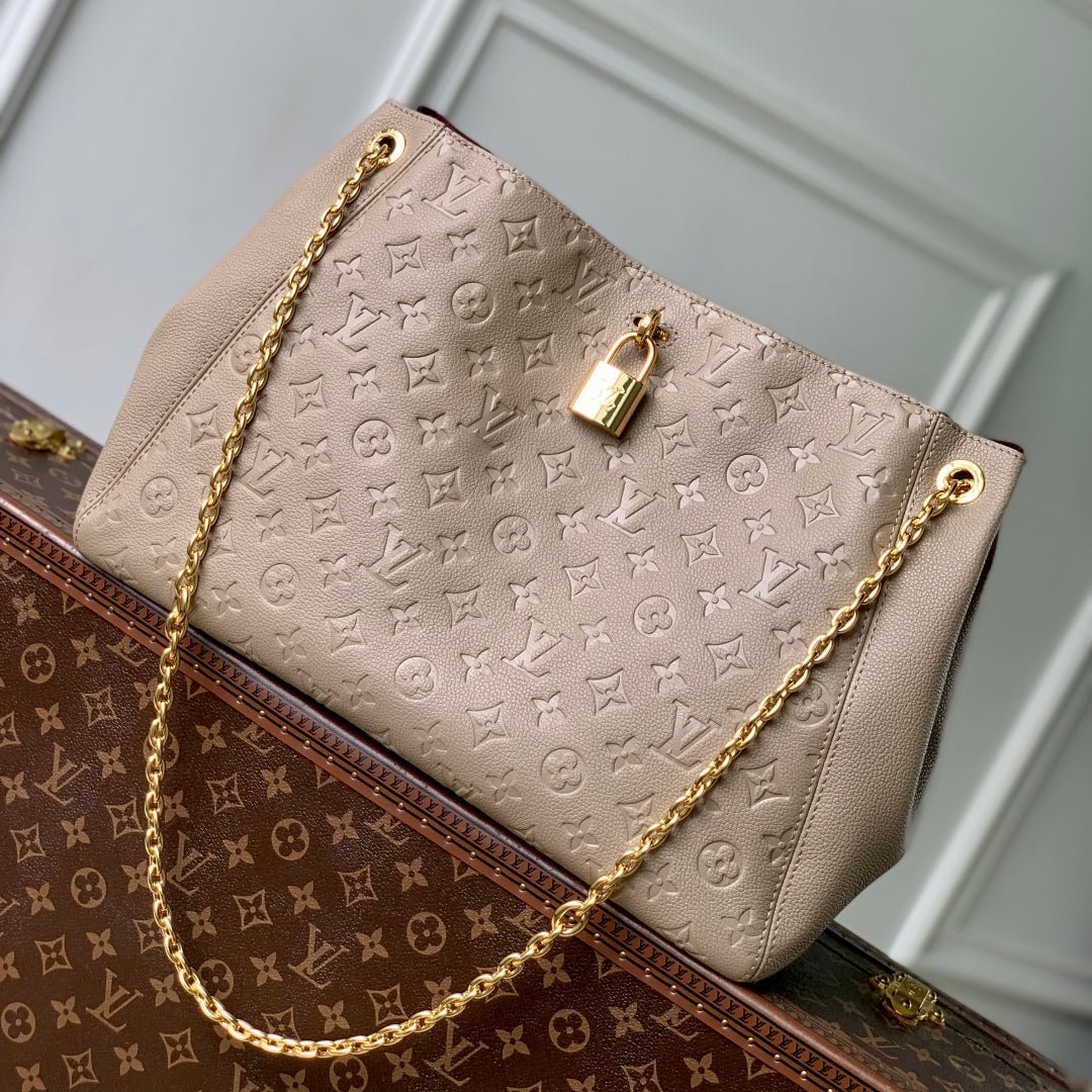 {Style No: URIS4S63} ANYTIME MM 42 IN TOURTERELLE GRAY MONOGRAM EMPREINTE CALFSKIN GOLD HARDWARE