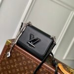 {Style No: SECR6FG8} TWIST SLIM 19 IN BLACK TAURILLON CALFSKIN WITH PEARL CHAIN