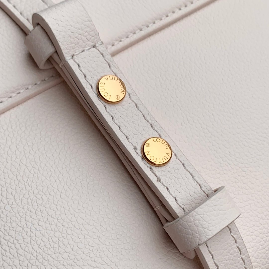 {Style No: UC5LFYYU} TWIST SLIM 19 IN LIGHT PINK TAURILLON CALFSKIN GOLD HARDWARE - Image 9