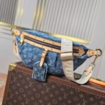 {Style No: 71JK7YNV} LV 25S BUMBAG 38 IN BLUE MONOGRAM DENIM LEATHER TRIM GOLD HARDWARE
