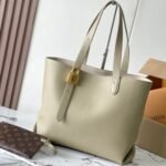 {Style No: NJQCCASL} LOW KEY CABAS 47 IN BEIGE GRAINED CALFSKIN GOLD BUCKLE