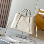 {Style No: OL4OALFU} BABYLONE TOTE 31 IN WHITE MONOGRAM EMPREINTE LEATHER