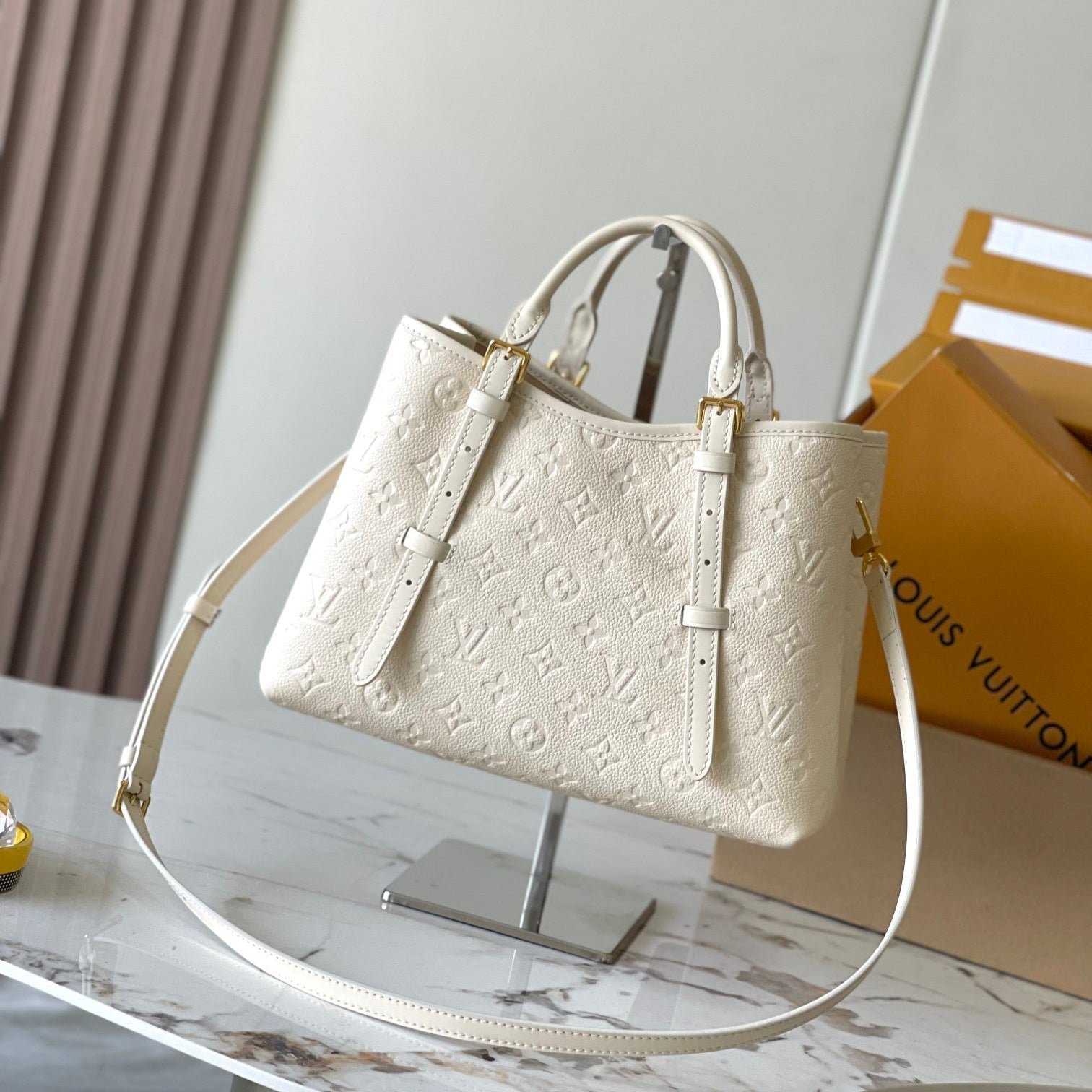 {Style No: OL4OALFU} BABYLONE TOTE 31 IN WHITE MONOGRAM EMPREINTE LEATHER