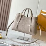 {Style No: 8W4ETQZ7} BABYLONE TOTE 31 IN TOURTERELLE MONOGRAM EMPREINTE LEATHER