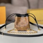 {Style No: K7M89TCA} NOE PURSE 11.5 NANO CHARM BROWN MONOGRAM REVERSE CANVAS
