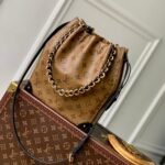 {Style No: LS4W5CQS} NOÉ TRUNK 23 IN BROWN MONOGRAM REVERSE CANVAS GOLD HARDWARE
