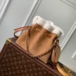 {Style No: MPC61Z4N} BELLA 22 IN CINNAMON BROWN MONOGRAM PERFORATED SUEDE AND WHITE SHEARLING TRIM
