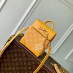 {Style No: S973S8TU} STEAMER 18 IN PEPPER ORANGE MONOGRAM HERITAGE CANVAS GOLD HARDWARE