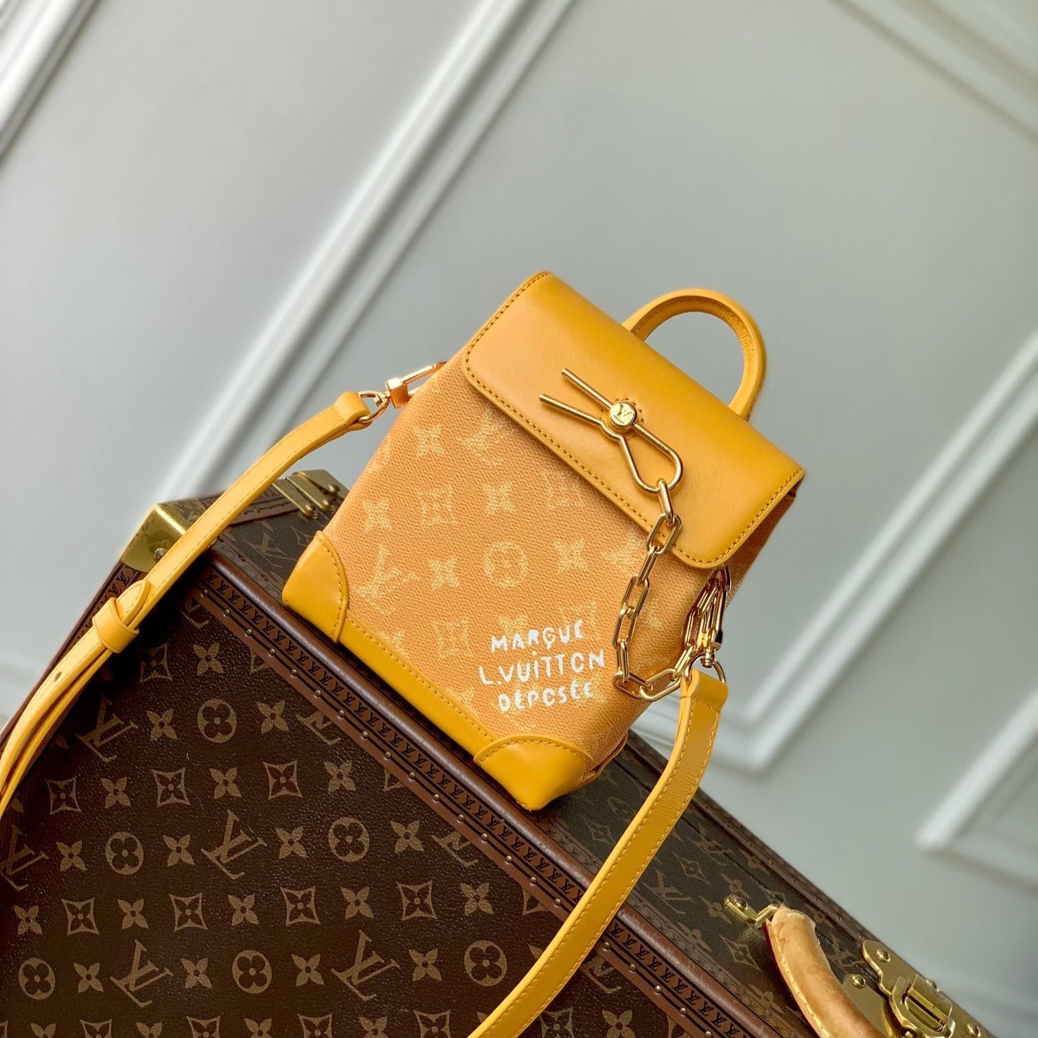 {Style No: S973S8TU} STEAMER 18 IN PEPPER ORANGE MONOGRAM HERITAGE CANVAS GOLD HARDWARE