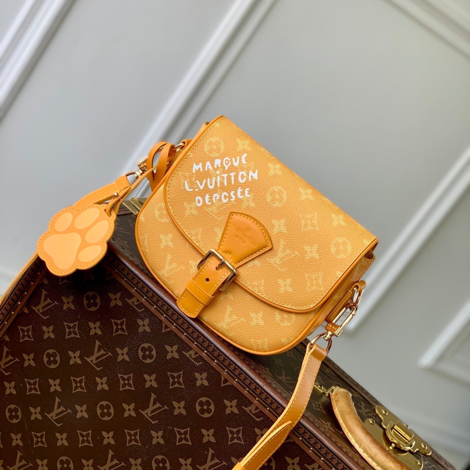 {Style No: EDKQKU7U} MONTSOURIS MESSENGER PM 20 IN PEPPER ORANGE MONOGRAM HERITAGE CANVAS