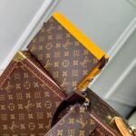 {Style No: RK6NZYDQ} GASTON WEARABLE WALLET 18 IN BROWN MONOGRAM CANVAS MIX YELLOW CALFSKIN