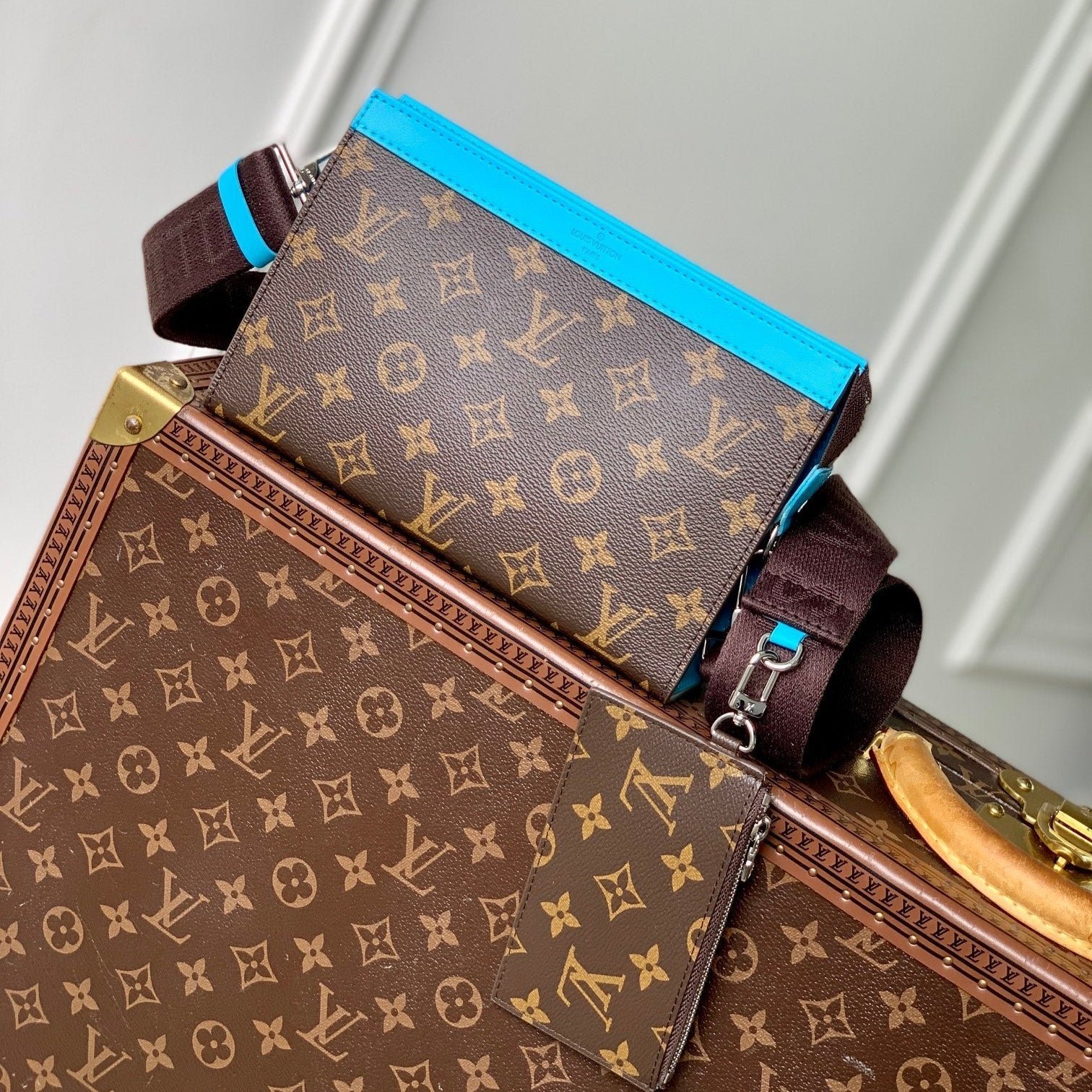 {Style No: 66OG7A17} GASTON WEARABLE WALLET 18 IN BROWN MONOGRAM CANVAS MIX SKY CALFSKIN