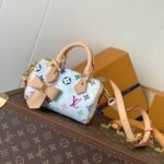 {Style No: JUY1E3K9} NANO SPEEDY BAG 16 IN COLORFUL MONOGRAM PATTERN AND WHITE COATED CANVAS