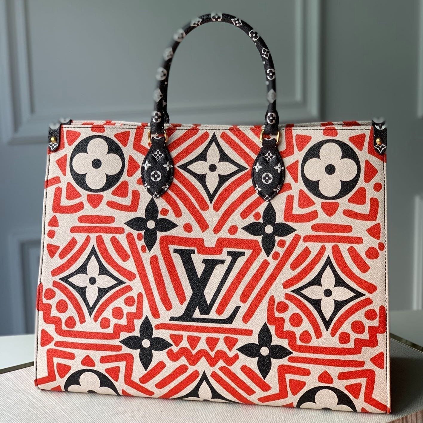 {Style No: XD3IEW91} LV CRAFTY ONTHEGO GM CREAM AND RED MONOGRAM GIANT CANVAS