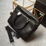 {Style No: XQ78P29Z} EMBOSSED LOGO BRIEFCASE 38 IN BLACK SMOOTH CALFSKIN