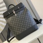 {Style No: 9MJJG4E2} STEAMER BACKPACK 45 IN GUN METAL MONOGRAM ECLIPSE CANVAS AND BLACK CALFSKIN SILVER BUCKLE