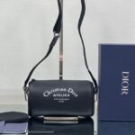 {Style No: R1OIG71Q} ROUND BUCKET 21 BAG IN BLACK LAMBSKIN