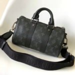 {Style No: Q36HOFAB} KEEPALL BANDOULIÈRE 25 IN BLACK MONOGRAM HERITAGE CANVAS