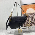{Style No: 6OMXRWLA} CD Saddle Bag Strap Warm Taupe Grained Black Calfskin