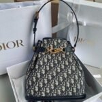 {Style No: XGNGYOMB} MEDIUM C’EST 24 IN BLUE CD-EMBOSSED OBLIQUE JACQUARD