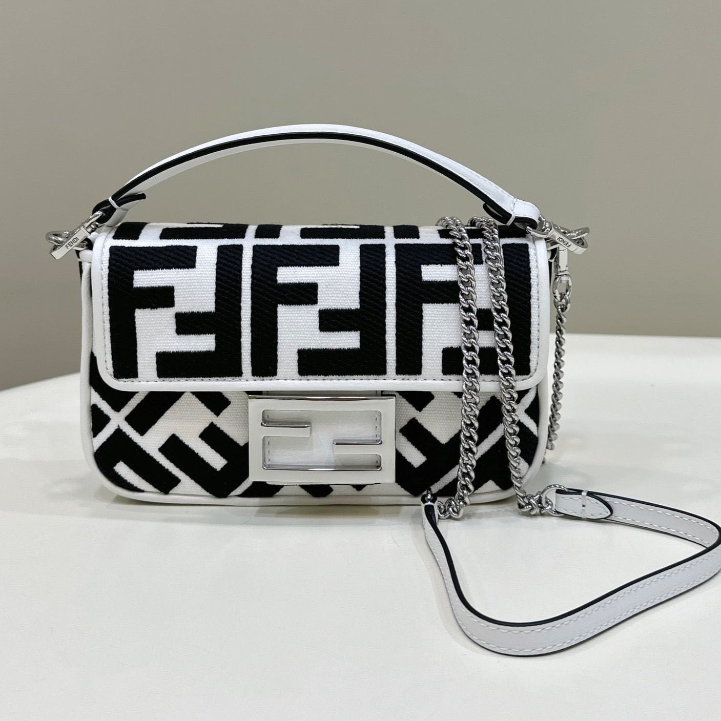{Style No: 7OGK713Y} FENDI 19 BAGUETTE BAG IN BLACK MIX WHITE CANVAS WITH GOLD HARDWARE
