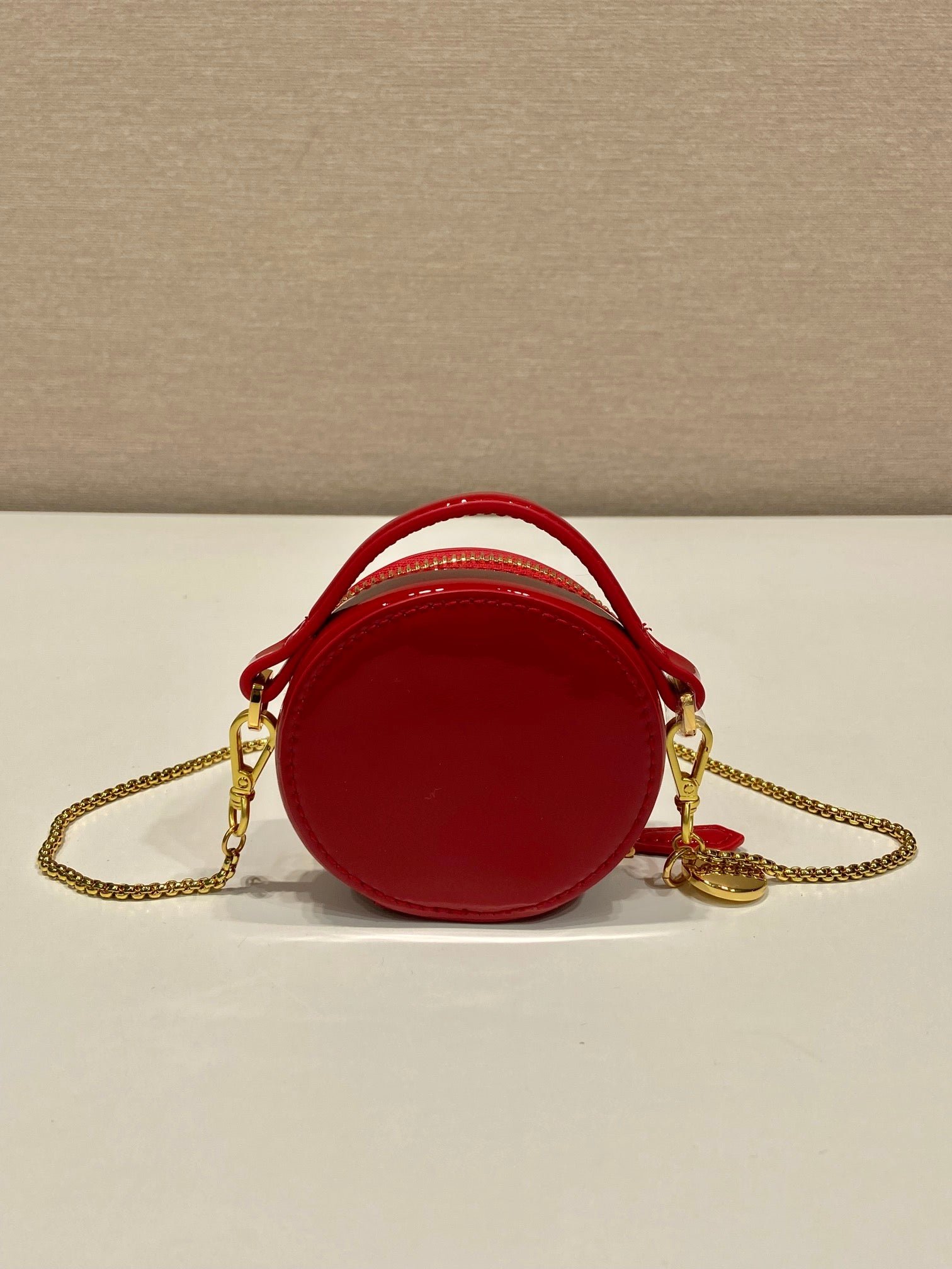 {Style No: BZX24P2Q} MINI ROUND BAG 8 IN RED GLOSSY CALFSKIN GOLD HARDWARE - Image 3