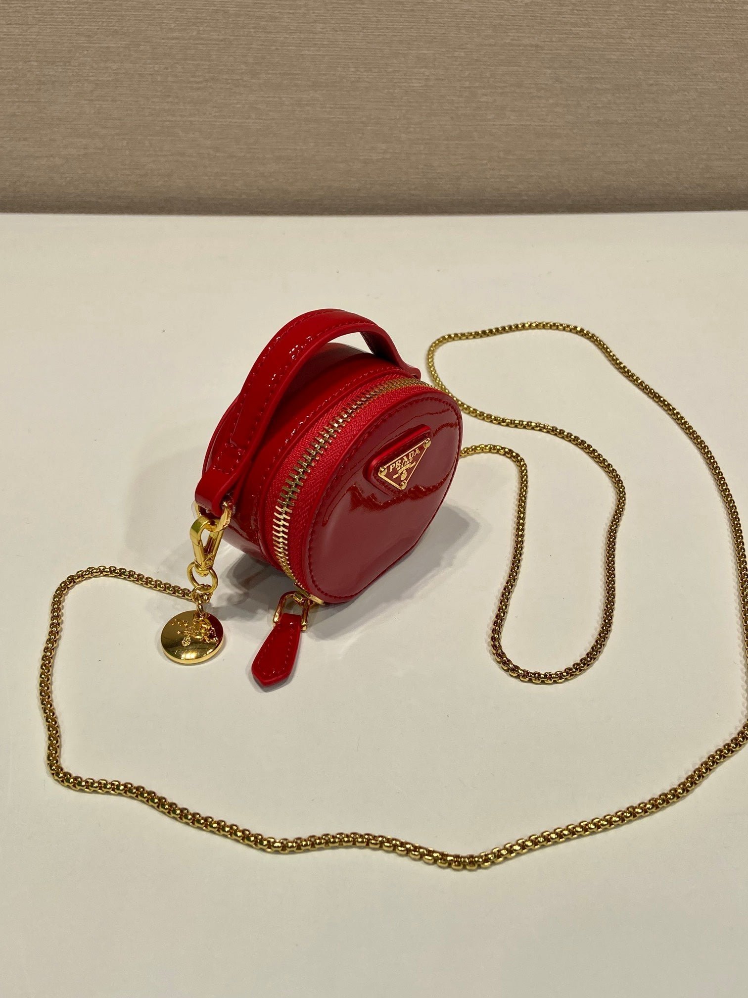 {Style No: BZX24P2Q} MINI ROUND BAG 8 IN RED GLOSSY CALFSKIN GOLD HARDWARE - Image 8