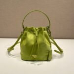 {Style No: ZJCFGHYB} BUCKET BAG 19 IN APPLE GREEN RE-NYLON AND SAFFIANO LEATHER HANDLE