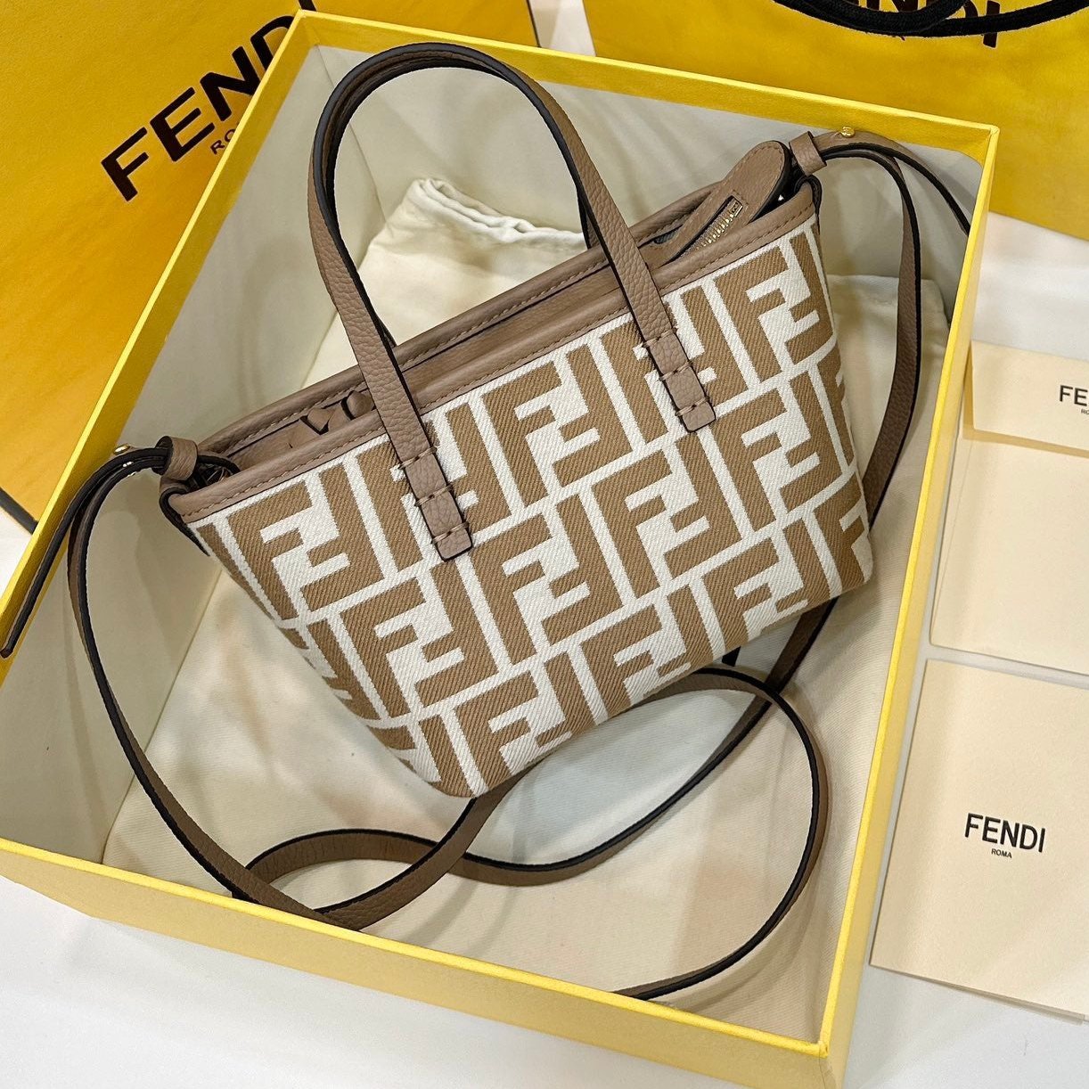{Style No: N3CX62Q4} MINI ROLL BAG 15 PEANUT BROWN MIX WHITE FF JACQUARD FABRIC