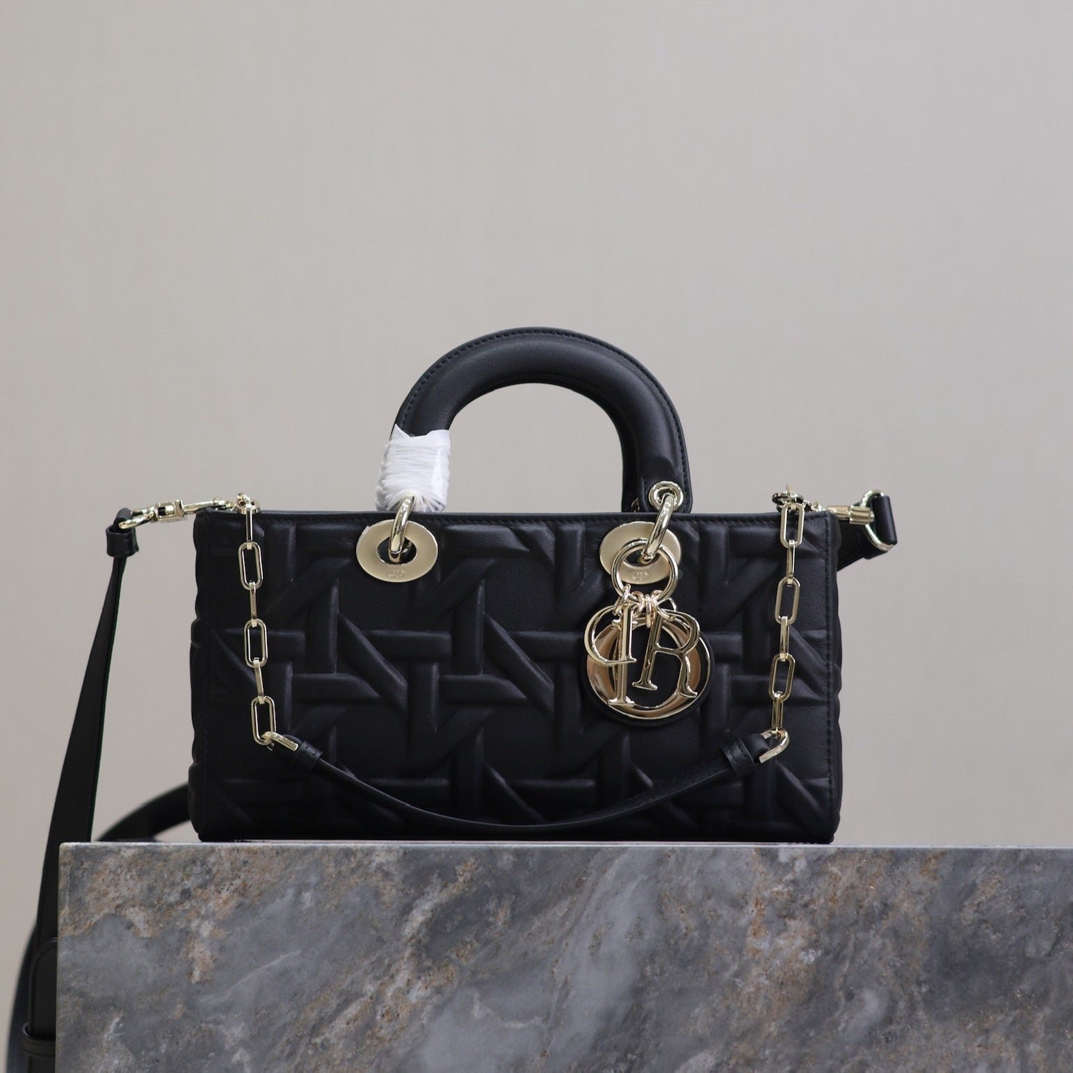 {Style No: GV5A6ZSA} LADY D-JOY BAG 26 IN BLACK GRAPHIC CANNAGE CALFSKIN PALE GOLD-FINISH METAL CHARMS