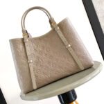 {Style No: Q6B5H628} BABYLONE TOTE MM 39 IN TOURTERELLE MONOGRAM EMPREINTE LEATHER