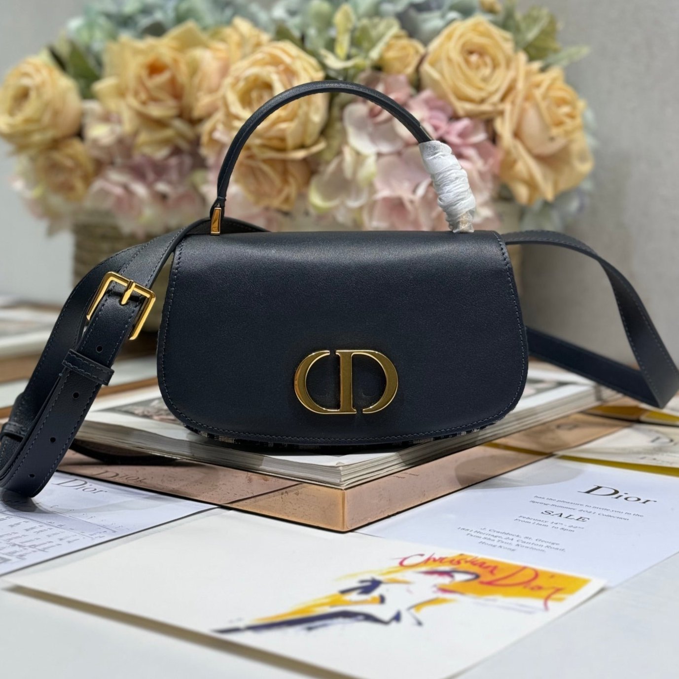 {Style No: PPPI39BU} SMALL 19 MONTAIGNE AVENUE TOP HANDLE BAG BLUE DIOR OBLIQUE JACQUARD AND BLACK SMOOTH CALFSKIN 221158