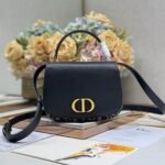 {Style No: I1YLOM6N} SMALL 19 MONTAIGNE AVENUE TOP HANDLE BAG BLUE DIOR OBLIQUE JACQUARD AND BLACK SMOOTH CALFSKIN