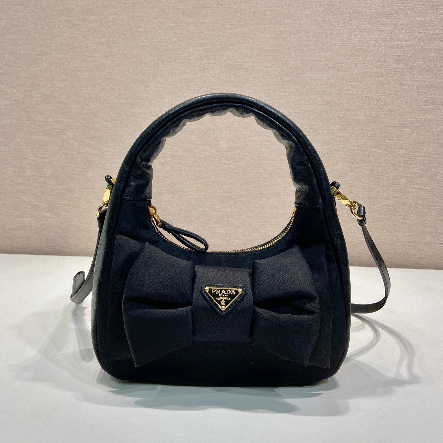 {Style No: RPSGXC5V} BOW HOBO BAG 22 IN BLACK RE-NYLON AND LAMBSKIN