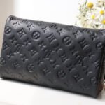 {Style No: NTBJZV6O} DOPP KIT TOILETRY BAG 28 CM IN BLACK TAURILLON MONOGRAM LEATHER