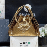 {Style No: 2TEJC9LE} CHANEL 25 MEDIUM HANDBAG IN GOLDEN BROWN CALFSKIN WITH GOLD HARDWARE