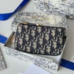 {Style No: X22AVF72} DIOR 25S TRAVEL MYRTE ZIPPED KEY CASE 14 IN DARK BLUE DIOR OBLIQUE JACQUARD CANVAS