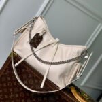 {Style No: MU82VCE9} CARRYALL CARGO VIBE PM 33.5 IN VANILLE LAMBSKIN BORWN MONOGRAM TAG