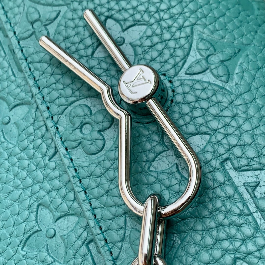 {Style No: V6T68G8I} STEAMER WEARABLE WALLET 18 IN TEAL GREEN MONOGRAM TAURILLON CALFSKIN - Image 8