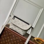 {Style No: 1YECBL9Z} PULSE WEARABLE WALLET 22.5 IN SAND MONOGRAM SHADOW EMBOSSED CALFSKIN