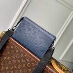 {Style No: ZET33S3M} POCHETTE VOYAGE 22 IN DARK BLUE MONOGRAM SHADOW CALFSKIN