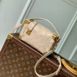 {Style No: XAO73WO1} SIDE TRUNK 19 IN BEIGE MONOGRAM BOLD CALFSKIN GOLD HARDWARE